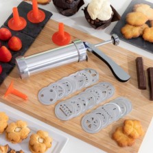 Máquina de bolachas e saco pasteleiro 
