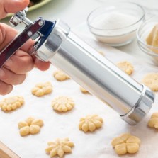 Máquina de bolachas e saco pasteleiro 