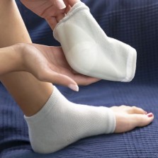 Meias hidratantes com almofada de gel e óleos naturais